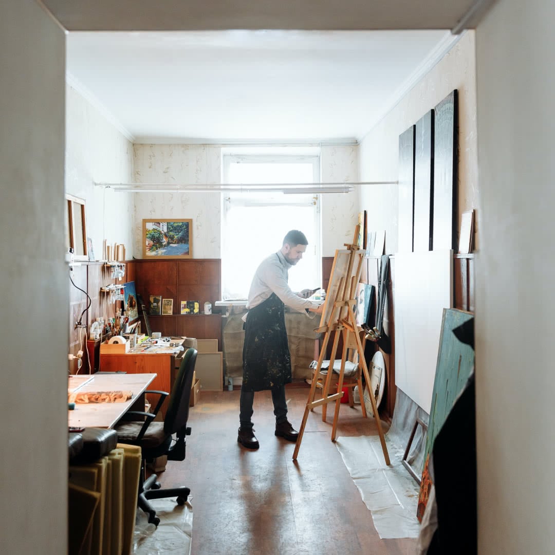Business owner working at his art practice